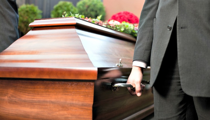Man carrying a casket